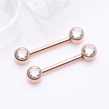 Detail View 1 of A Pair of Implant Grade Titanium Rose Gold Bezel Set Sparkle Internally Threaded Nipple Barbell-Clear Gem